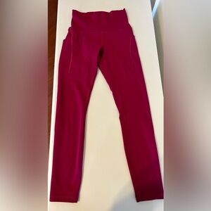 Lululemon size 4 Wundertrain Highrise Tight with pockets  25”